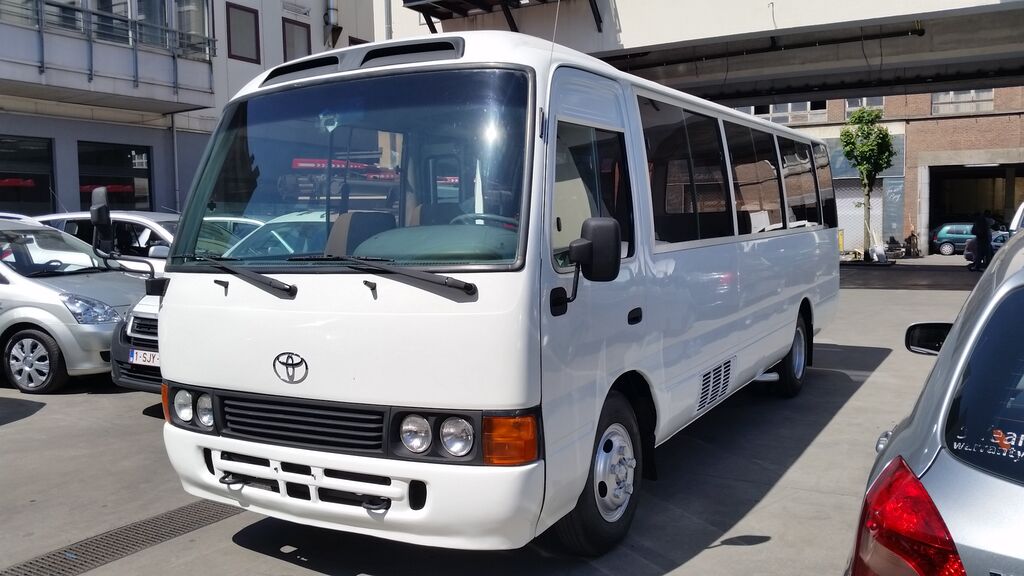 TOYOTA Coaster.Petrol.30 seats.Japan made not China. passenger vans