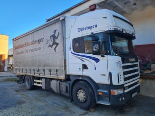 Scania R 124 420 curtainsider truck